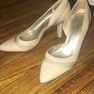 Anne Klein nude pointed toe pumps.  Medium heel.